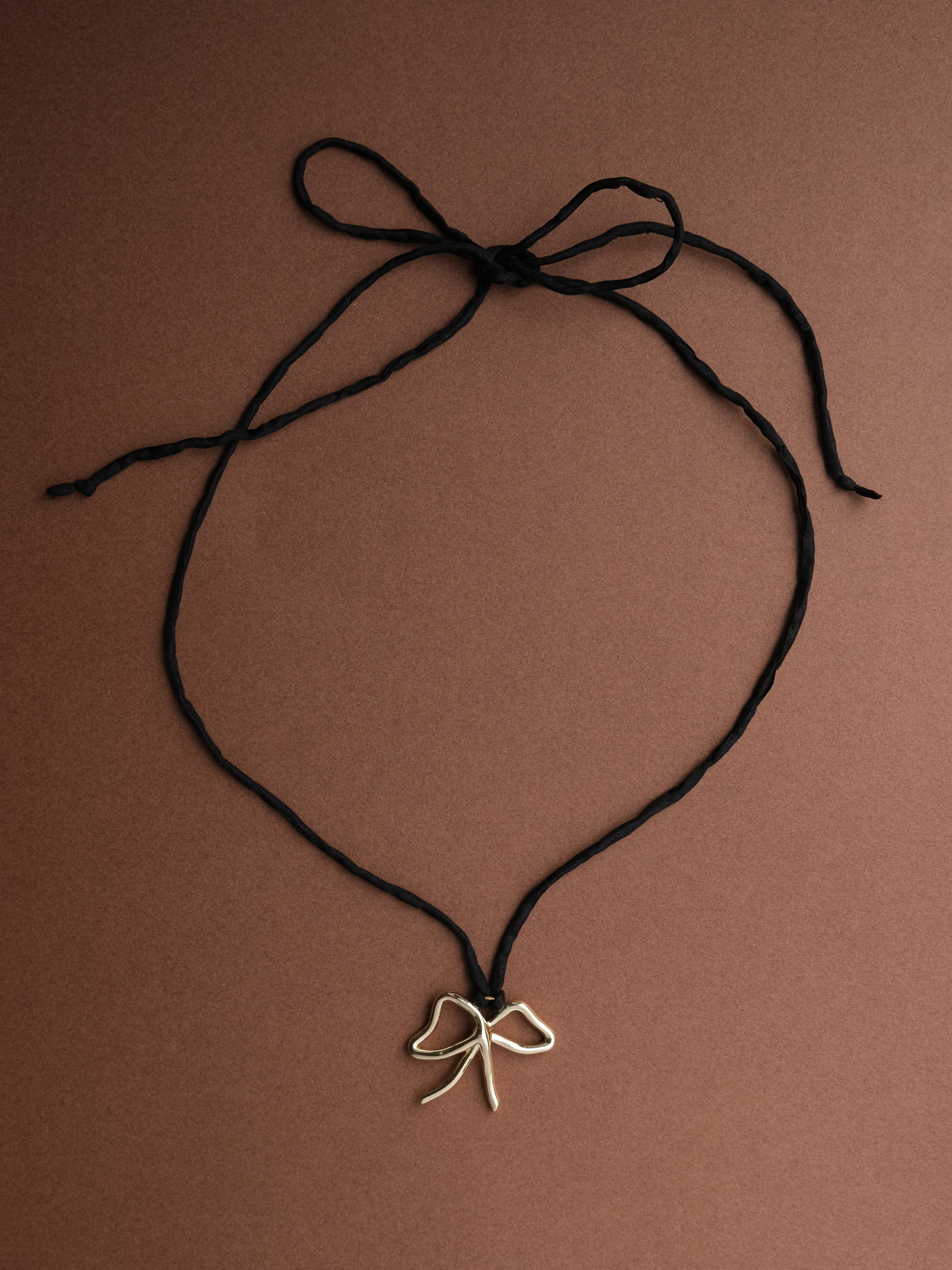 THE BOW PENDANT